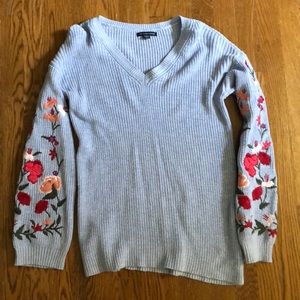 Lavender sweater with floral embroidery